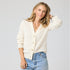 Pretty little button-front cream cardi in 100% cashmere with V-neck - Shop women's cute cardigans by Kerri Rosenthal