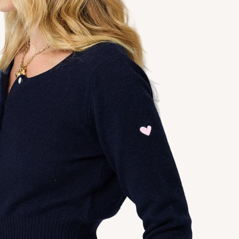 Charmed beige button-down cashmere cardigan with an embroidered tiny heart by Kerri Rosenthal