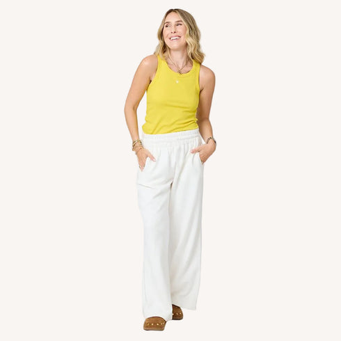 Weekend cream palazzo sweatpant in 100% cotton fleece with elastic waist and yellow tank top by Kerri Rosenthal