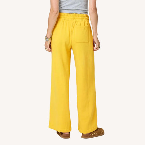 Weekend yellow palazzo sweatpant in 100% cotton fleece with a contrast side stripe and elastic waist by Kerri Rosenthal