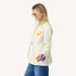Workday Love Rises single-breasted beige blazer in cotton blend with removable heart-shaped hanky by Kerri Rosenthal