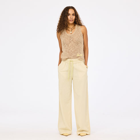 Beige wide leg palazzo pants in 100% cotton blend with beige sweater tank top and an elastic waist by Kerri Rosenthal