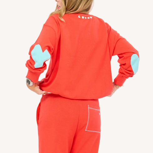 The ex-boyfriend imperfect heart red sweatshirt in 100% cotton fleece with heart elbow patches - Shop cute women’s sweatshirts by Kerri Rosenthal