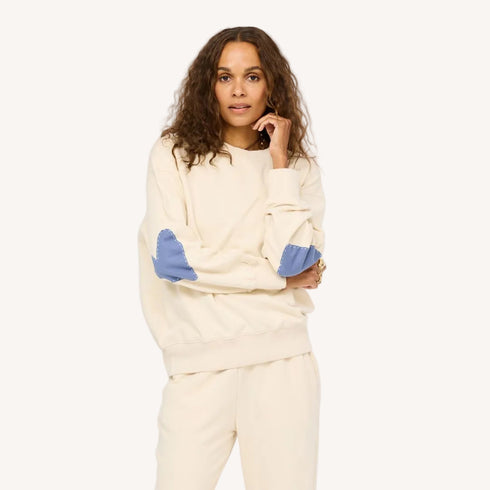 The ex-boyfriend imperfect heart sand beige sweatshirt in 100% cotton fleece with heart elbow patches - Shop cute women’s sweatshirts by Kerri Rosenthal