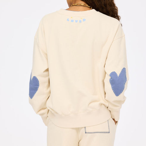 The ex-boyfriend imperfect heart sand beige sweatshirt in 100% cotton fleece with heart elbow patches - Shop cute women’s sweatshirts by Kerri Rosenthal