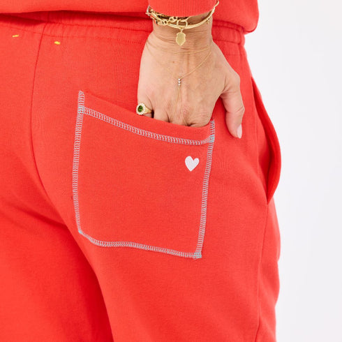 The weekend barb red sweatpants in 100% cotton with side pockets and a tiny embroidered heart - Shop cute women’s sweatpants by Kerri Rosenthal