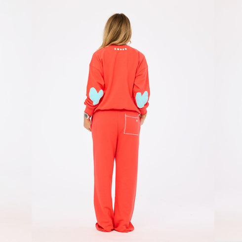 The weekend barb red sweatpants in 100% cotton with side pockets and a tiny embroidered heart - Shop cute women’s sweatpants by Kerri Rosenthal