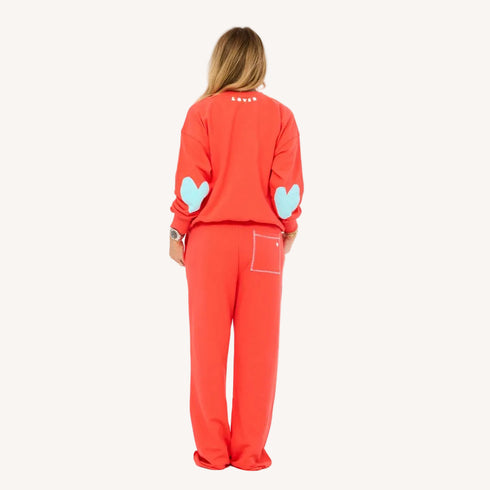 The weekend barb red sweatpants in 100% cotton with side pockets and a tiny embroidered heart - Shop cute women’s sweatpants by Kerri Rosenthal