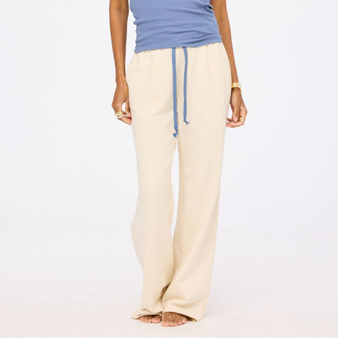 The weekend barb sand beige sweatpants in 100% cotton with side pockets and a tiny embroidered heart - Shop cute women’s sweatpants by Kerri Rosenthal