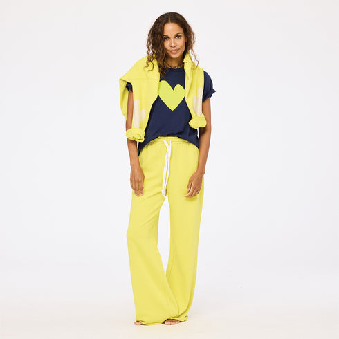 Weekend barb lime green sweatpants in 100% cotton with navy blue tee and lime green sweats by Kerri Rosenthal