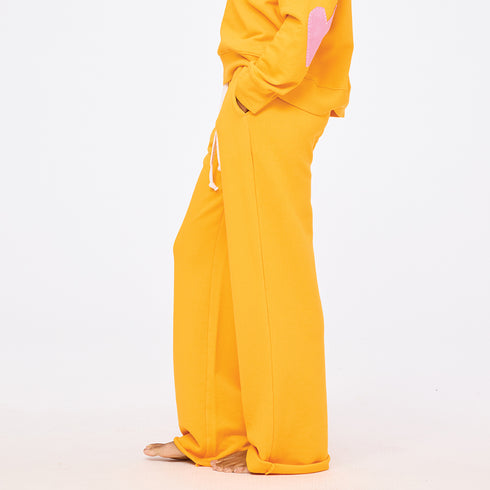 Weekend barb orange sweatpants in cotton with a heart embroidery - Shop best sweatpants by Kerri Rosenthal