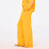 Weekend barb orange sweatpants in cotton with a heart embroidery - Shop best sweatpants by Kerri Rosenthal