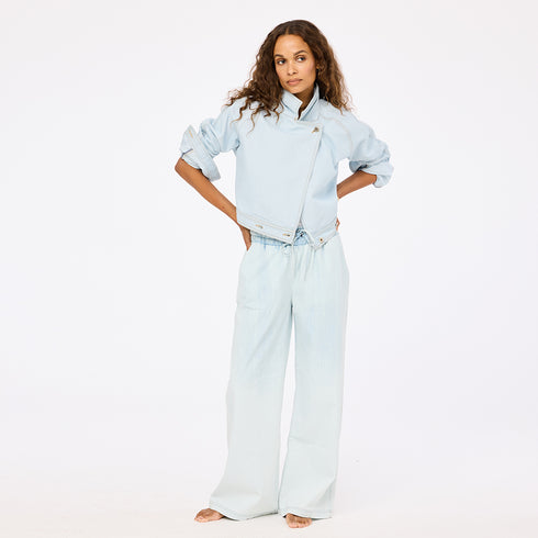 Light blue wide leg palazzo pants in 100% cotton denim with light denim jacket by Kerri Rosenthal