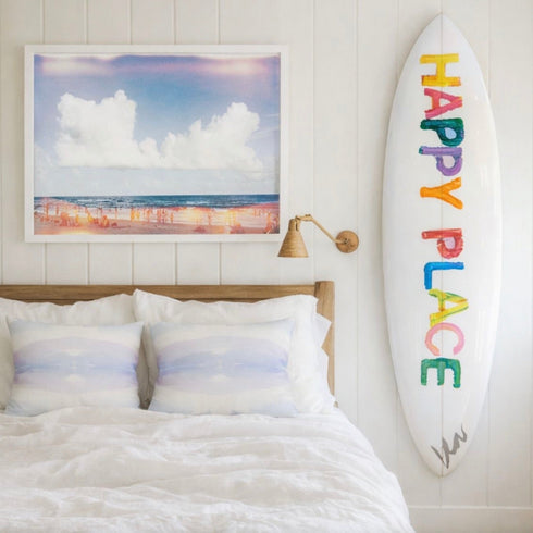 Gustavia Lilac Sky square decorative throw pillows with a surfboard wall art 'Happy Place' by Kerri Rosenthal