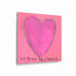 Le Temps de l'Amour art print: a magenta-pink heart on a pink background, with "Le Temps de l'Amour" hand-painted below it in black, printed on brushed aluminum