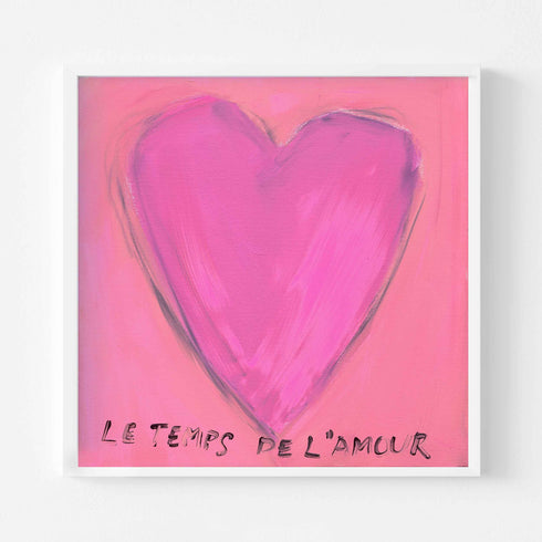 Le Temps de l'Amour art print: a magenta-pink heart on a pink background, with "Le Temps de l'Amour" hand-painted below it in black, in a white frame