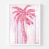 Where Love Grows art print: a palm tree built from layers of pink, coral and lavender hearts with the words love, beauty, strength and compassion, on a pale pink ground with pink paint drips, in a white frame