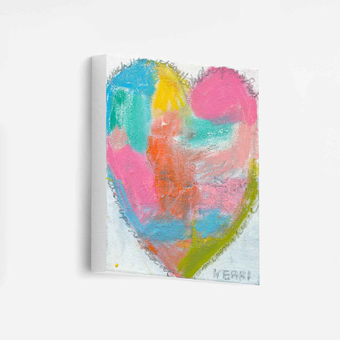 Wish Upon a Heart art print: a heart of soft patches of sky blue, teal, sunshine yellow, hot pink and coral with a lime-green stroke along one edge and a scribbled gray outline, printed on stretched canvas and shown at an angle
