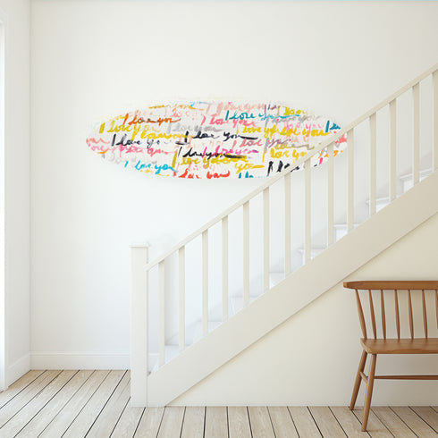 This signed piece includes watertight plugs for easy vertical or horizontal wall hanging.