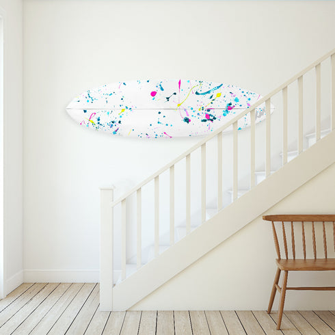 This colorful surfboard is perfect for hanging on your wall or leaning in your space, bringing coastal energy to any room.