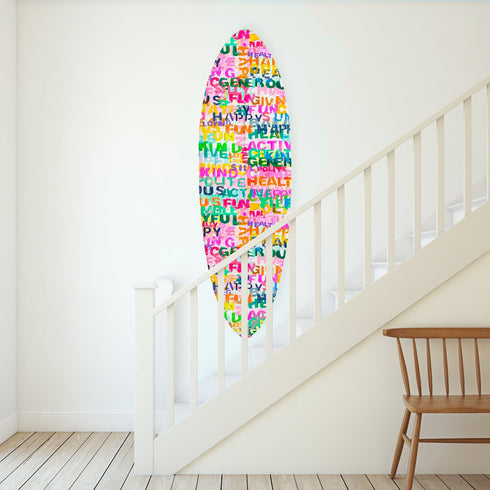 This surfboard showcases Kerri’s love for words and design, offering a visual mantra whether it's displayed or surfed.