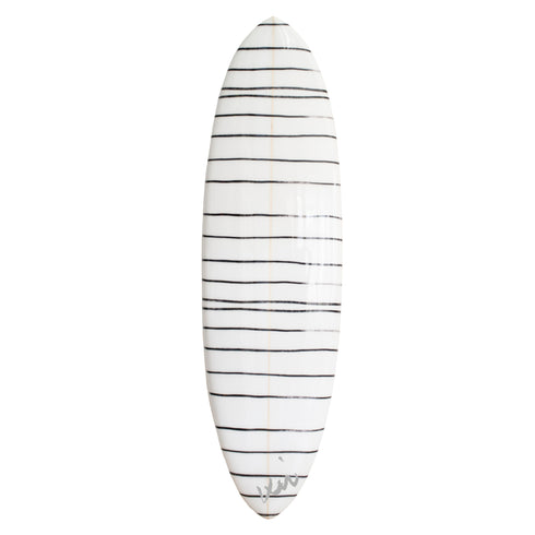 Collectible surfboard, handmade, designer surfboard that doubles as modern wall art, featuring a carbon black finish signed by Kerri Rosenthal