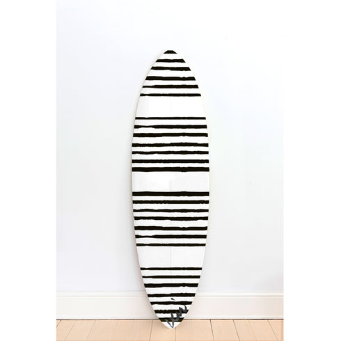 The black and white surfboard stripe design brings striking contrast and graphic energy to any coastal home or modern art space.
