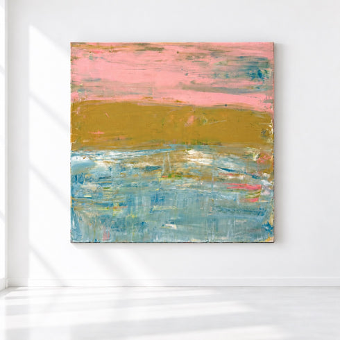 Last Light in Malibu, an abstract painting of a pink sky, golden shore, and textured turquoise water, on a white wall.