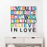 Set up your room with vibrant colors using the 'Love Rules' art print word wall artwork by Kerri Rosenthal