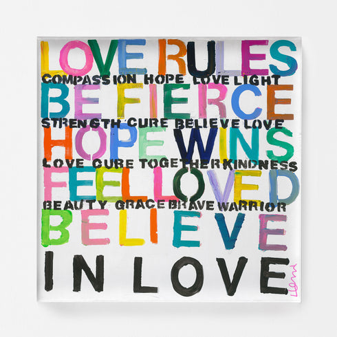 Set up your room with vibrant colors using the 'Love Rules' art print word wall artwork by Kerri Rosenthal