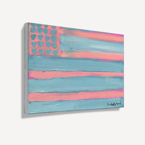 Side angle view of unframed pastel flag painting showing canvas depth and texture, pink and blue stripes with heart-shaped stars