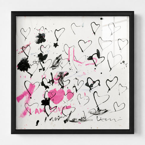 Abstract black and pink heart painting in black wood frame, gestural hand-drawn hearts and paint splatter with "I Am Love" lettering