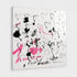 Alternate angled perspective of abstract heart painting, highlighting dimensional canvas edge with black line hearts and pink paint accents