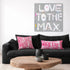 Love Actually Pillow pop pink square and rectangular lumbar throw pillows on couch by Kerri Rosenthal