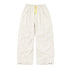 Close-up of natural white drawstring pants product flat by Kerri Rosenthal