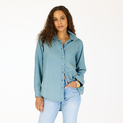 Love On Repeat blue denim button-up shirt with embroidered tiny yellow heart - Cute women's denim shirts by Kerri Rosenthal