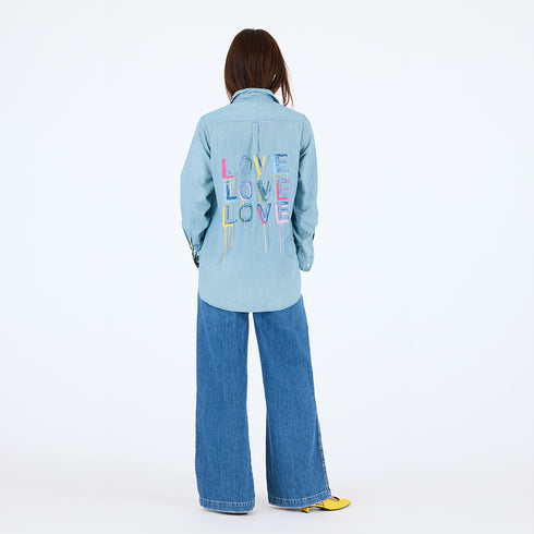 Love On Repeat blue denim button-up shirt with Love printed graphic - Cute women's denim shirts by Kerri Rosenthal
