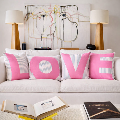 Love pink & white cute square decorative throw pillows on couch by Kerri Rosenthal