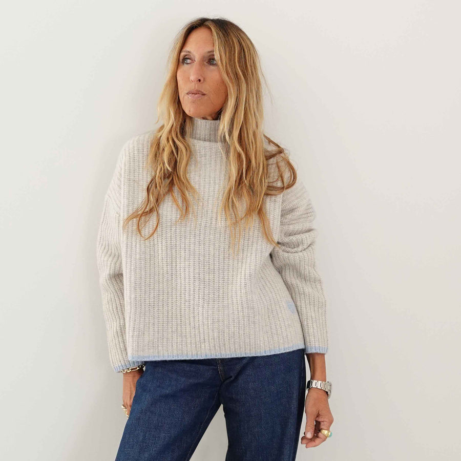 Kerri wearing Marley Cashmere Sweater in Misty Gray paired with dark jeans