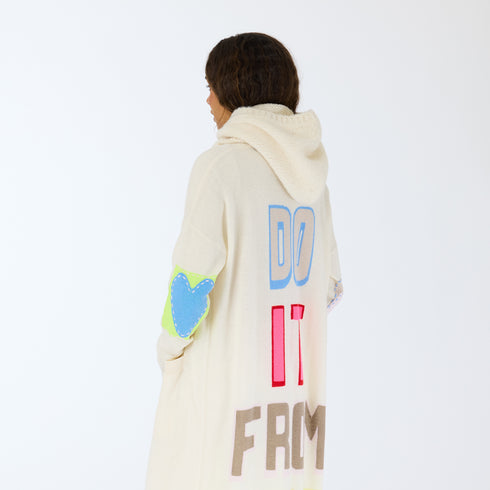 The Mc Luvin canvas hoodie is made from a wool-cashmere blend with a knit ruffled bottom and embroidered "LOVED" - Cute women’s hoodies by Kerri Rosenthal