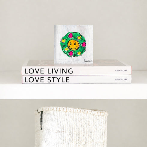 Mr. Smiley Wreath Block of Love by Kerri Rosenthal, colorful mini art encased in a 4 x 4 inch plexiglass block, styled view