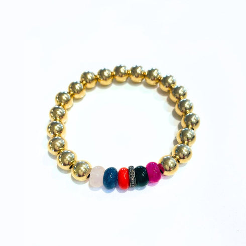 Our Gold Bead Bracelet brings a bright, beachy energy to your jewelry wardrobe with its mix of polished gold and multicolored natural stone rondels