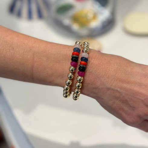 Our Gold Bead Bracelet brings a bright, beachy energy to your jewelry wardrobe with its mix of polished gold and multicolored natural stone rondels.