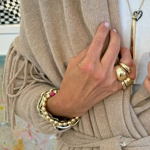 Our Gold Bead Bracelet brings a bright, beachy energy to your jewelry wardrobe with its mix of polished gold and multicolored natural stone rondels.