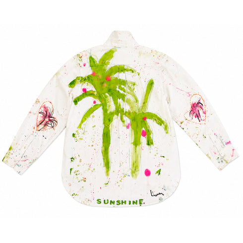 White button-down shirt hand-painted on the back with green tropical palm fronds accented with pink dots, heart outlines with palm motifs on both sleeves, and 'Sunshine' script at the hem — Kerri Rosenthal wearable art