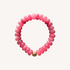 Perfect Pink stone bead bracelet is made of tinted jade & an 18K gold-plated bead. Handmade in Switzerland.