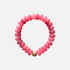 Perfect Pink stone bead bracelet is made of tinted jade & an 18K gold-plated bead. Handmade in Switzerland.