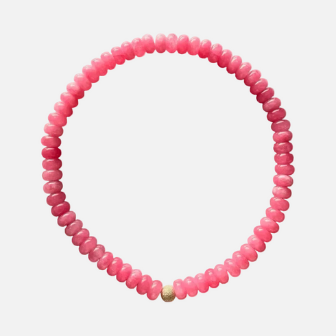 Perfect pink monochrome stone bead necklace is made of tinted jade & an 18K gold-plated bead, handmade in Switzerland.