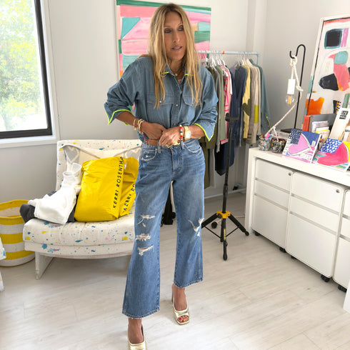 Western-style denim shirt with neon green stitching, chest pockets and a relaxed fit. made from 100% cotton with a button front.