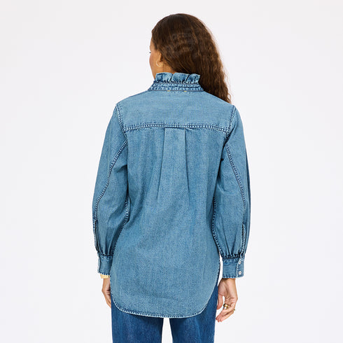 Puff-sleeve button-front blue denim shirt made from 100% cotton with double pockets and a ruffled neckline - Shop cute women’s button shirts by Kerri Rosenthal